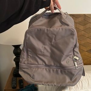 LIKE NEW Lululemon Backpack in light grey.